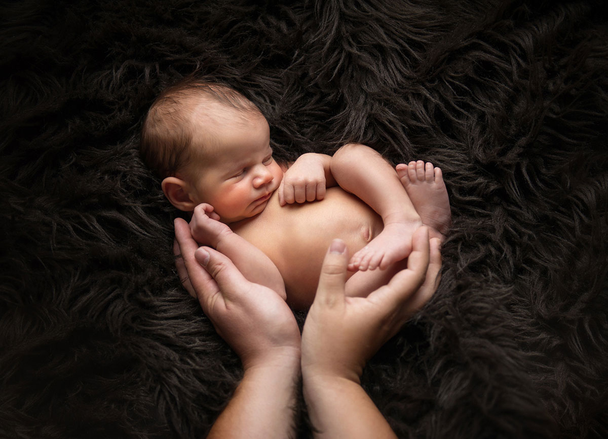 newbornfoto mit händen